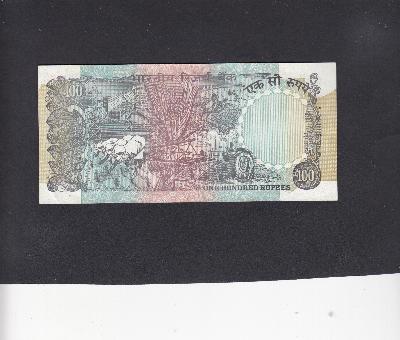 Beschrijving achterzijde: TRACTOR